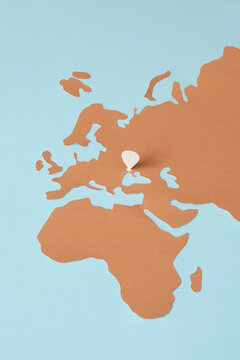 Paper craft map with location pin on Ukraine.