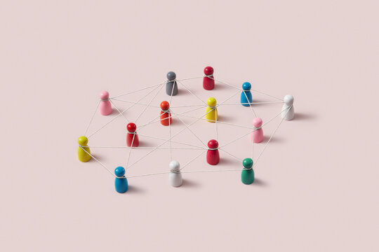 Multicolor game pawns connected by thread.