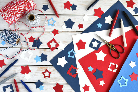 Patriotic crafting supplies red white blue paper stars for making cards or decorations - Powered by Adobe