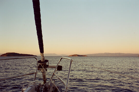 Sailboat sailing at sunset 