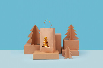 Papercraft set of gift boxes, christmas trees, baubles and garlands