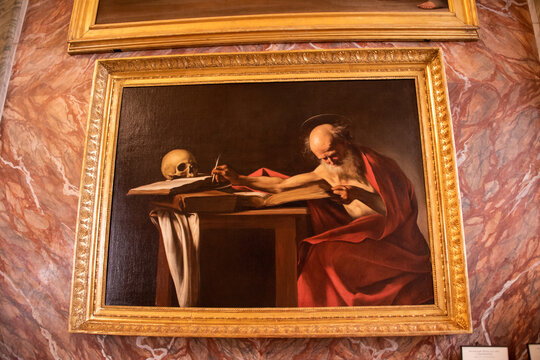 Rome, Italy - August 4th, 2022: Saint Jerome Writing, masterpiece of Caravaggio