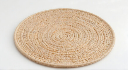 Fototapeta na wymiar A Round woven placemat placed on a white isolated background, View from above, round mat or rattan, 