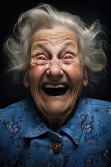 old, elderly woman laughs. portrait of a crazy grandmother, senior. happy retirement age.