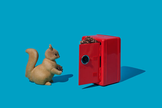 squirrel saving some pine cones in a safe