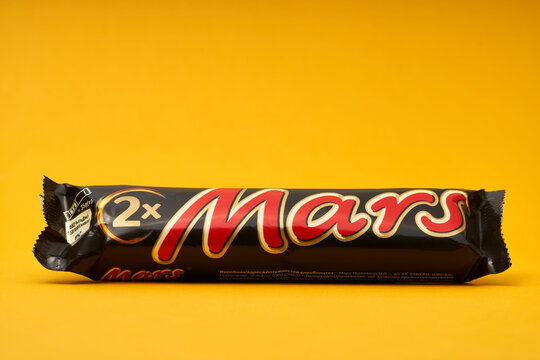 Lviv, Ukraine - February 14, 2024: Mars chocolate bar on yellow background