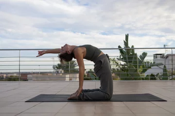 Tragetasche yoga at the terrace Spain  © davidallphoto