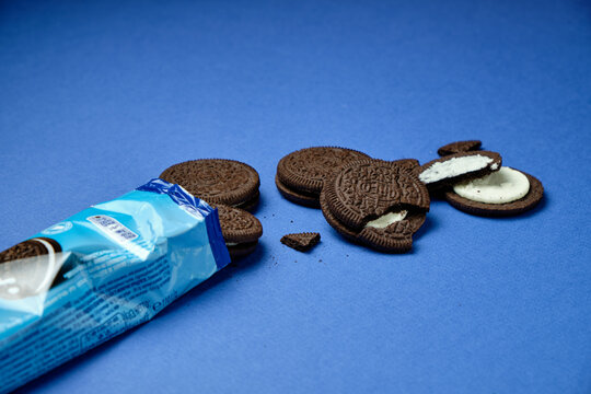 LVIV, UKRAINE - November 27, 2023: open pack of oreo original on a blue background