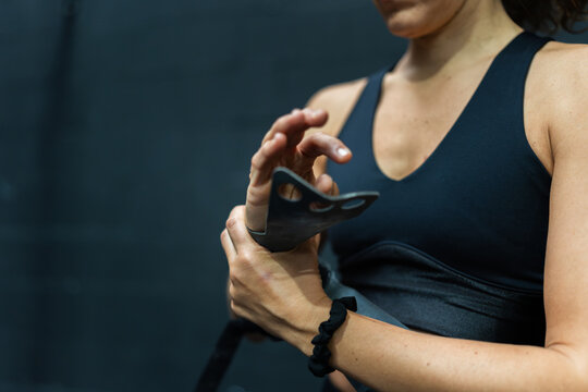 Close-up of a woman getting ready to train at the gym
