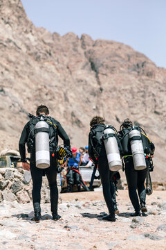 Group of Scuba Divers in the desert