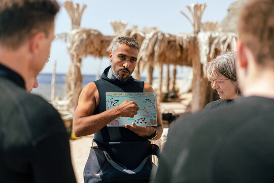 Scuba diving instructor giving briefing