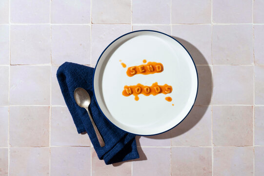 Alphabet pasta on plate spelling out funny message.