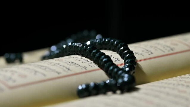 Religion The Book Of Islam Quran And Rosary Beads