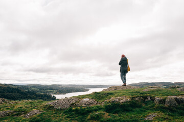 Walker looking at view over Lake Windermere
