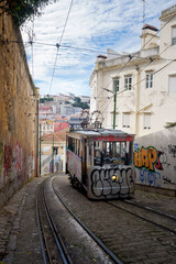 Historical tram going uphill in Lisbon, Portugal