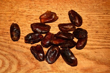 Pitted dates on a wooden board
