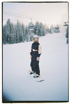 Woman snowboarding