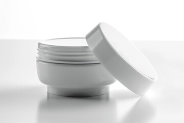 White Cosmetic containers isolated on white
