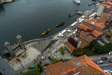 Aerial drone view of the Douro River and the Porto promenade with the Rabelas, classic boats for...