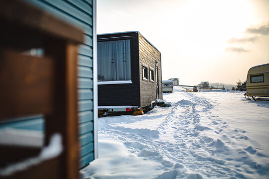 Tiny houses on winter camping on ski resort.