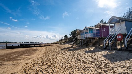 Obraz premium Wells beach and beach huts on the North Norfolk coast on a sunny day