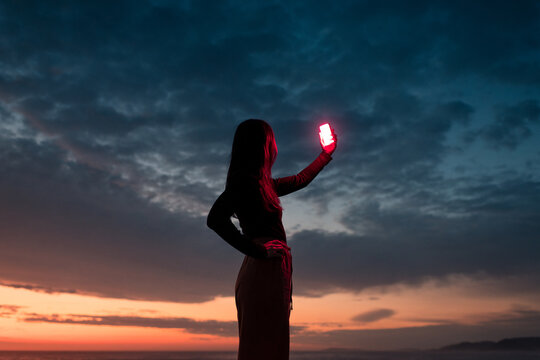 Woman looking for phone coverage