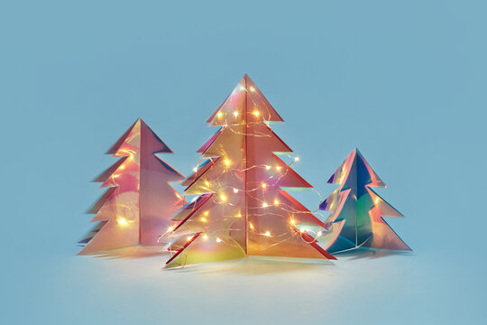 Holiday set of Christmas trees handmade of trendy holographic foil