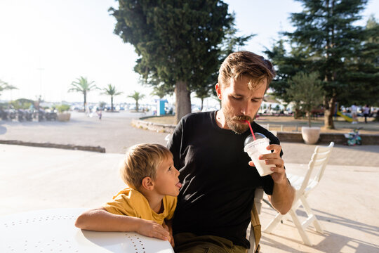 Man drinks his son's milkshake