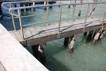 A pier on the shore for mooring boats and yachts.