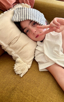 Kid girl with fever UGC selfie 
