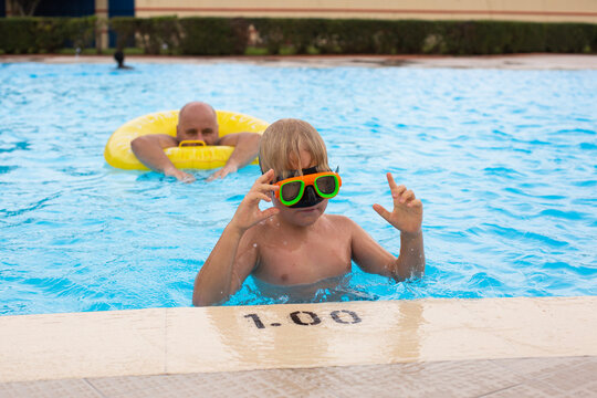 family spend time in the aquapark outdoor