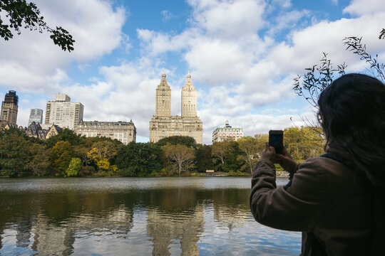 Tourist taking photos in Central Park