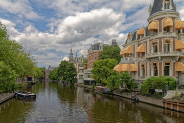 Fototapeta premium Amsterdam, the Netherlands - view of the old town from the water canal