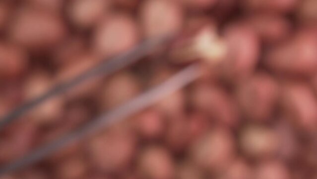 Red Peeled Peanut Close Up Background Texture
