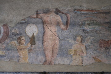 Old roman fresco with Eros in Ostia Antica - 770998158