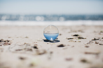 lens ball on beach
