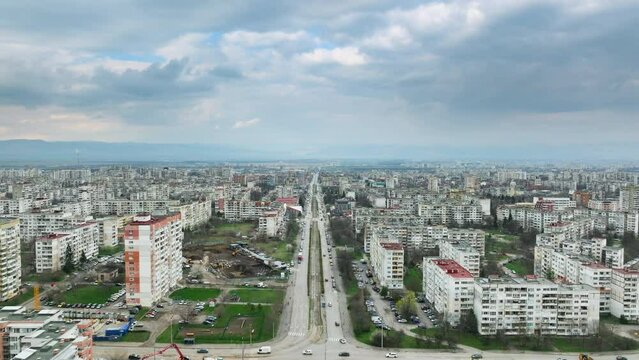 Drone flies towards Pancho Vladigerov boulevard in Lyulin district of Bulgarian capital Sofia in evening in early Spring.