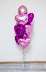 bunch of pink balloons on a white background, hearts balloons