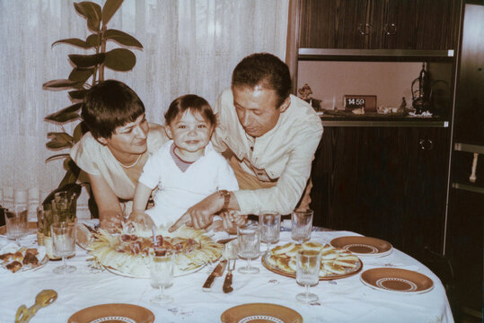 1979. A family celebrating a birthday