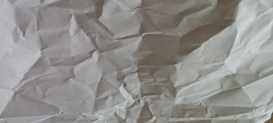 wrinkled crumpled  white paper background