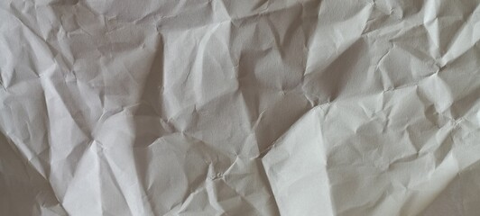 wrinkled crumpled  white paper background