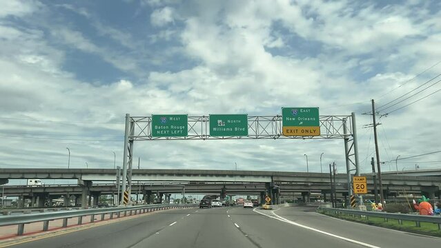 Signs on the interstate for Baton Rouge and New Orleans