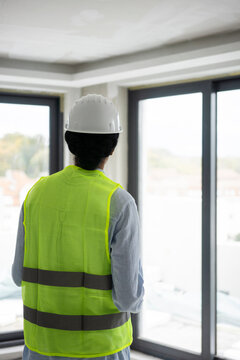 Woman engineer inspecting constraction site