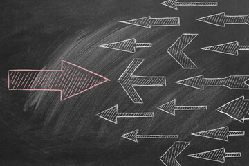 Conflict of interest or confrontation, change concept, opposition, think differently. Rivalry metaphor. Competitiveness symbol. Illustration on blackboard.