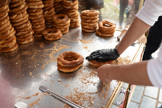 Seller Preparing Turkish Bagel On The Street Of Istanbul