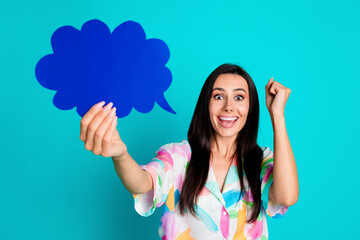 Photo of cheerful lovely glad woman wear trendy print clothes hand fist yes hooray empty space isolated on cyan color background - obrazy, fototapety, plakaty