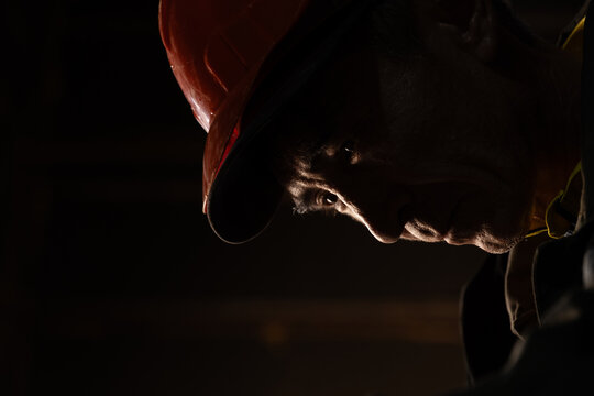 close-up of a miner in a helmet