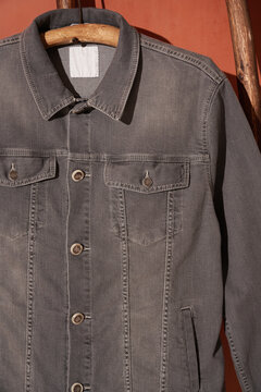Grey denim men's jacket close-up