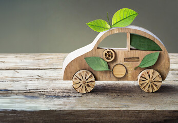 wooden car and nature themed visual. Concept explaining emissions and environmental pollution