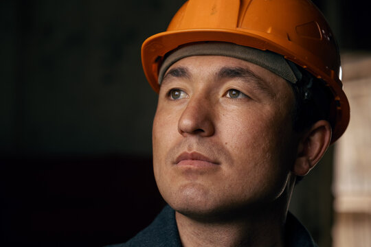 Portrait of a man wearing a work helmet